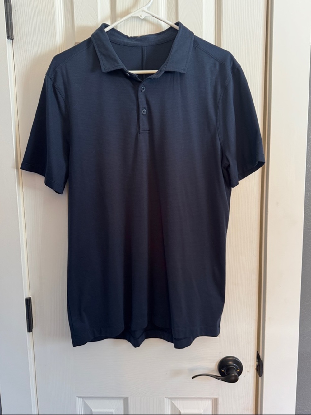 Men’s Lululemon ABC polo shirt in size medium , true navy color.